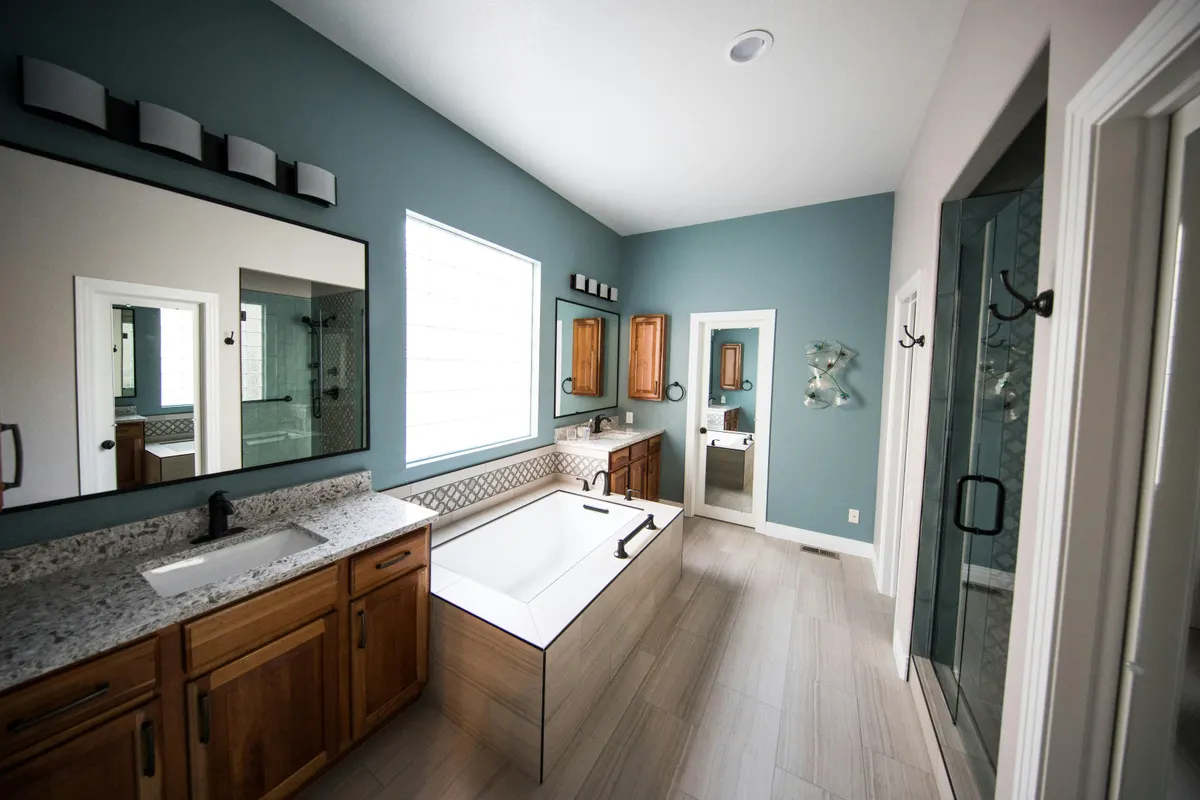 Calgary master bathroom renovation - soaker tub, dual vanity, spa-inspired design